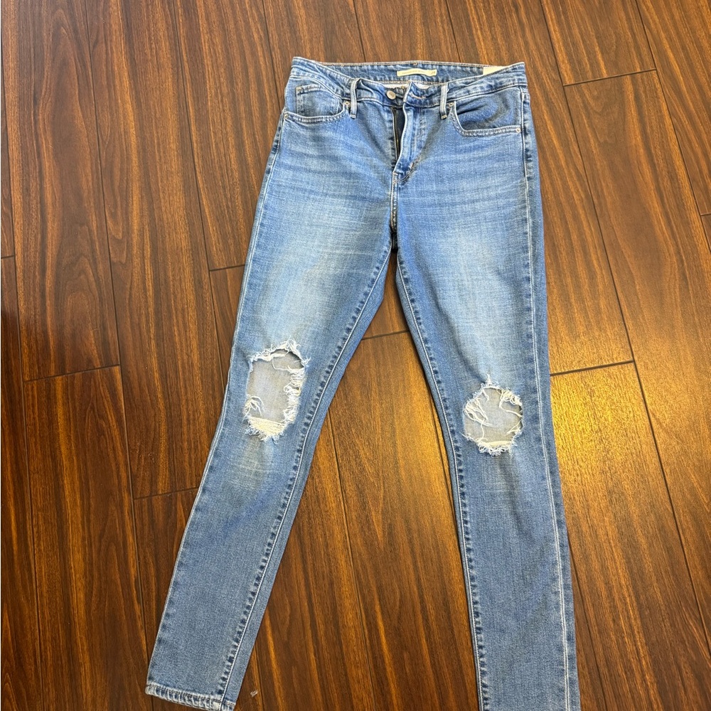 Women's Distressed Levi’s 721 High Rise Skinny Jeans